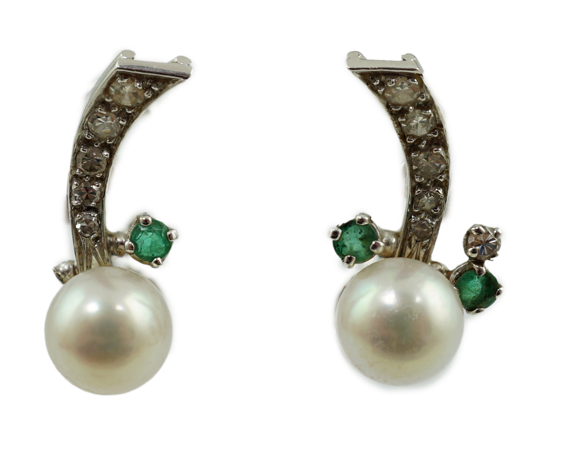 A modern pair of white gold, cultured pearl, emerald and diamond cluster set ear studs